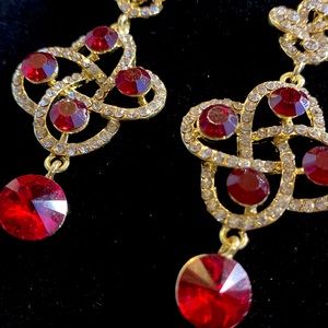 Gold-tone Ruby and clear colored rhinestone chandelier earrings!